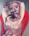Femme dans un fauteuil rouge 1929 Cubism